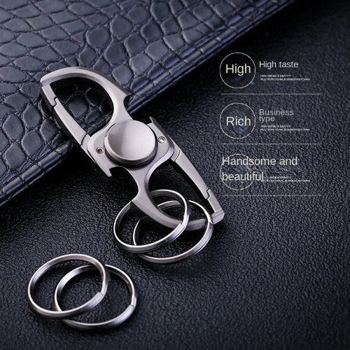 close-up of zinc alloy metal fidget toy UK with bottle opener and gyro function