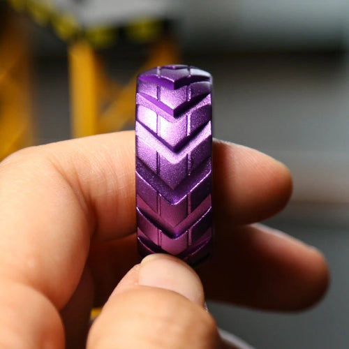 Ratchet Wheel EDC Fidget Ring purple on desk – quiet fidget for work and study