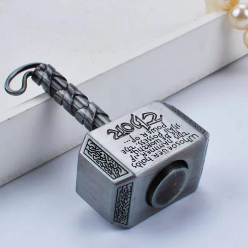 silver mini hammer metal fidget spinner toy close up