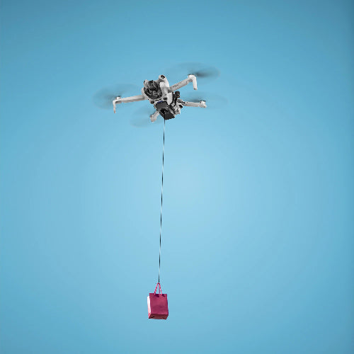 dji mini 4 pro airdrop system UK installed on drone for long range delivery