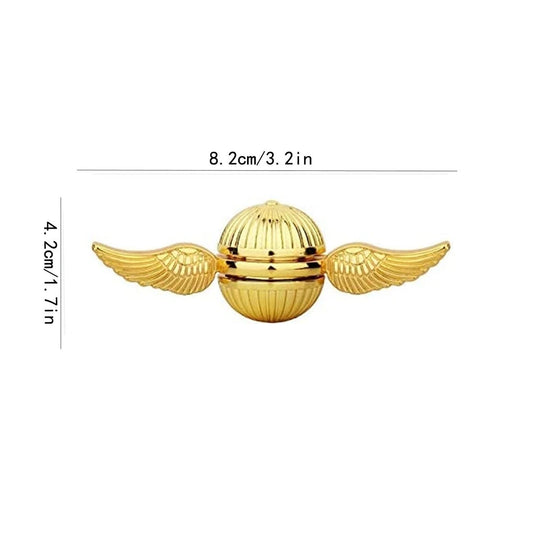 close-up of golden snitch fidget spinner spinning on desk – anxiety relief spinner UK