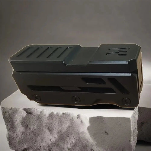 magnetic fidget slider being held in hand to show size and portability