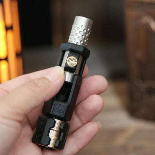 close-up of musketeers gun fidget spinner in gunmetal finish – anxiety relief fidget toy for adults