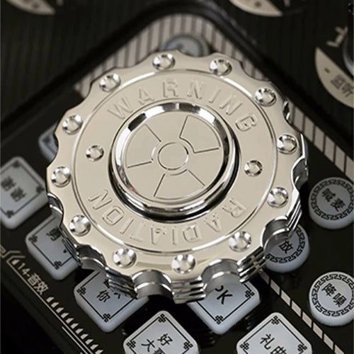 Close-up of Radiation Warning EDC Fidget Slider UK Spinner with R188 bearing – smooth spinning EDC gadget for focus