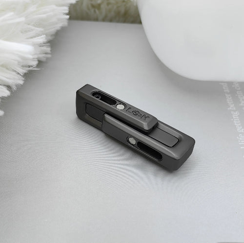 magnetic double push fidget toy next to storage pouch – portable EDC fidget tool for office and travel