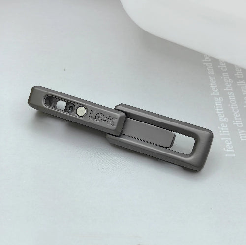 Desk setup featuring magnetic double push fidget toy used during work for silent stress relief and concentration