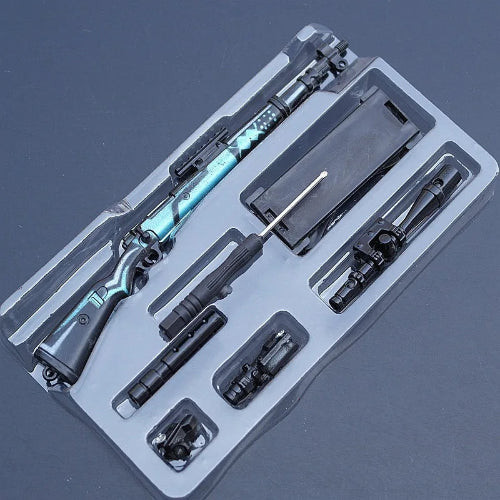 mini gun keychain collectible model in alloy design on white background