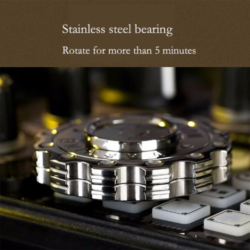 Hand holding Radiation Warning EDC Fidget Slider UK Spinner – durable alloy EDC spinner for stress relief UK edition