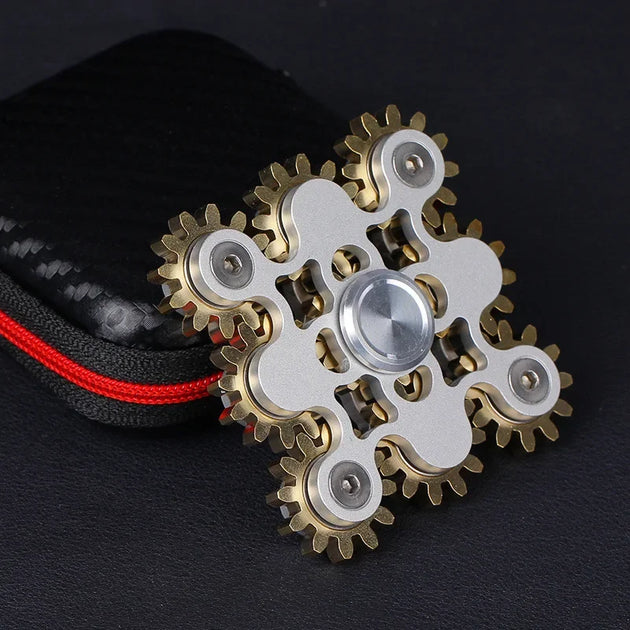 premium metal fidget spinner gears spinning on desk surface