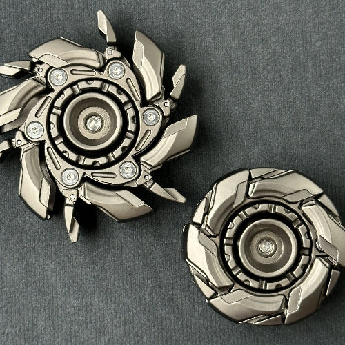 Open Armour fidget slider grey spinning on desk – silent fidget toy for work