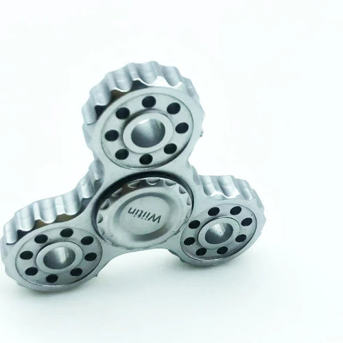 close up of fidget rings for anxiety ratchet wheel slider ring with magnetic feedback and smooth touch finish