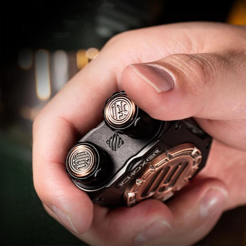 grey metal double-column ratchet fidget spinner UK shown for office desk use