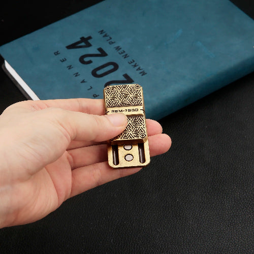 close-up of metal sliding fidget toy bronze magnetic for focus and anxiety relief