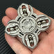 Metal Future Punk EDC Spinner shown in hand from front-facing angle