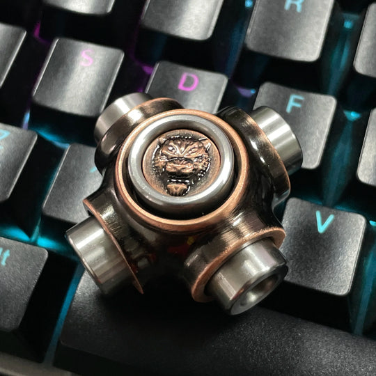 Spinner lit with keyboard RGB lighting in background